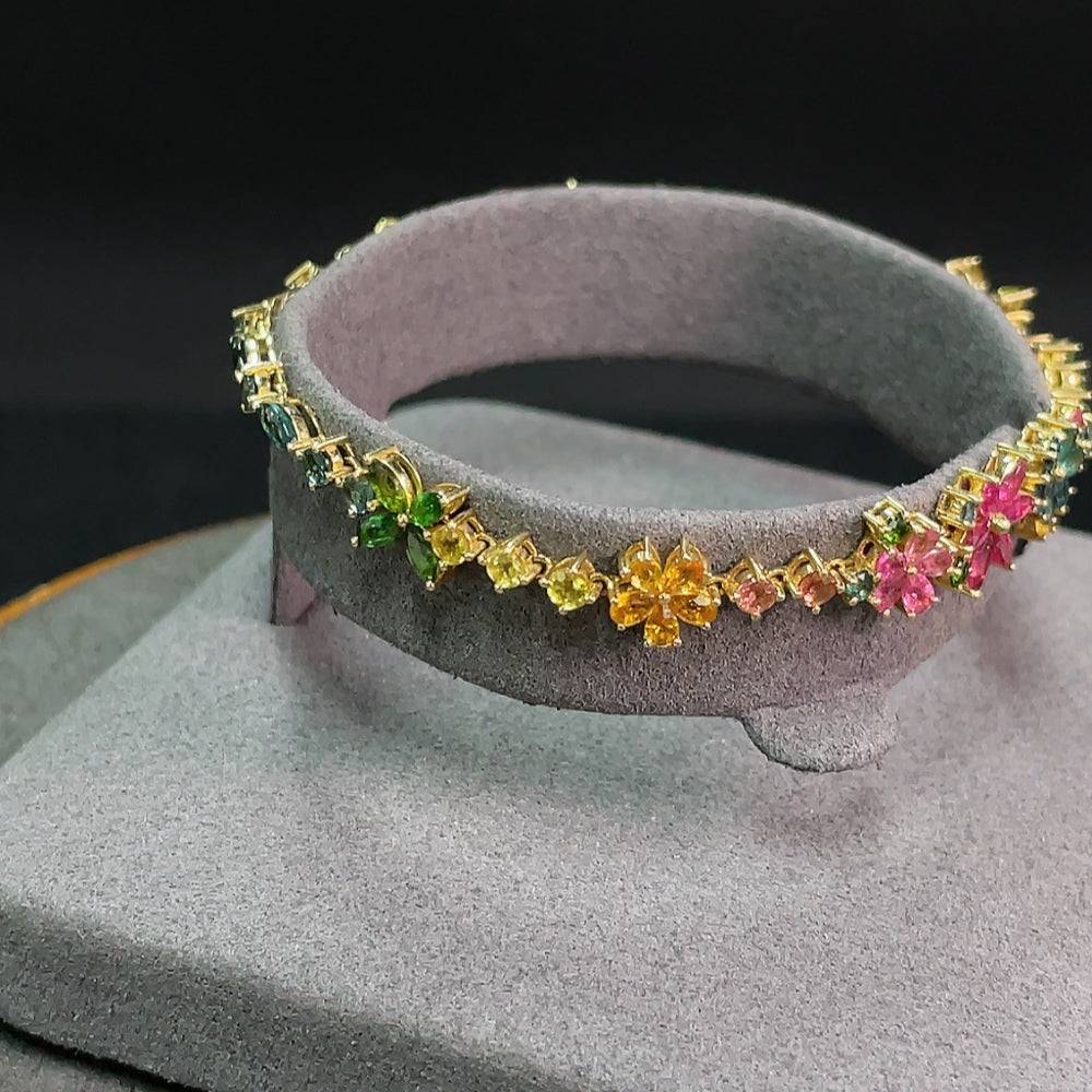 Huiliu certified tourmaline gemstone bracelet featuring colorful polished stones on a delicate jewelry chain.