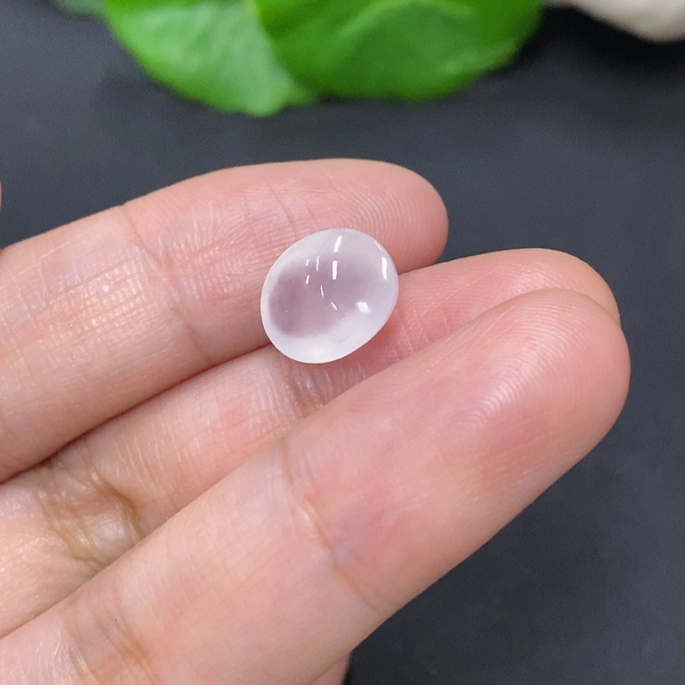 Green jadeite cabochon jewelry piece from HKHQ, featuring a smooth, polished 1g gemstone with a glossy finish.