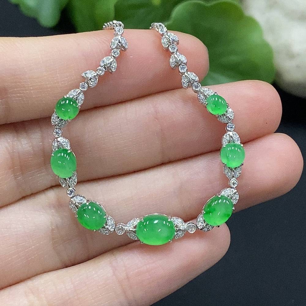 Jadeite inlaid necklace with 18K gold and diamond accents, featuring a detailed jade pendant on a gold chain.