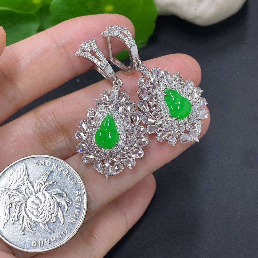 Huiliu Jadeite gourd earrings with diamond accents, crafted from green jade, featuring intricate inlaid design and elegant craftsmanship.
