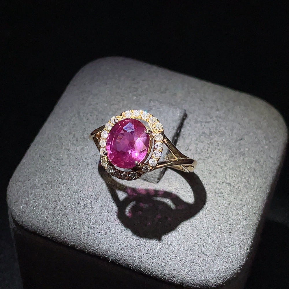 18K sapphire ring with diamond accents, size 14, showcasing a vibrant blue gemstone and sparkling diamonds on a gold band.