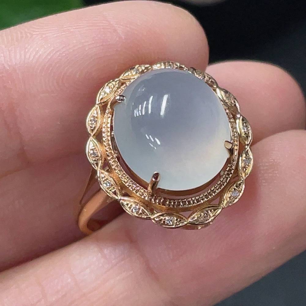 Jadeite inlaid ring by HUILIU HQ featuring 18k gold, diamond accents, size 13, with visible jade and intricate gold detailing