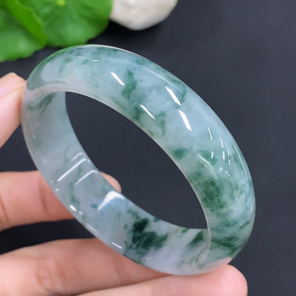 HKHQ jadeite oval bangle in size 58.8, weight 47.7g, showcasing smooth, polished green jadeite with a classic oval shape.