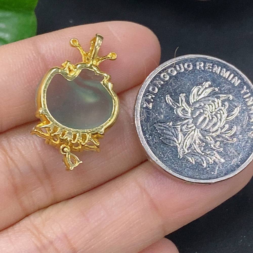 HUILIU HQ jadeite pendant with intricate inlay design, showcasing smooth green jade gemstone on a neutral background.