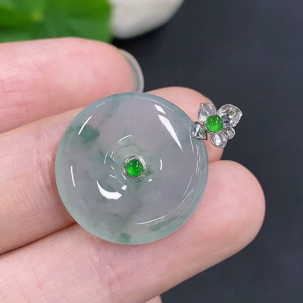 Jadeite peace knot pendant with 18K gold clasp, crafted from green jade, weighing approximately 4 grams.