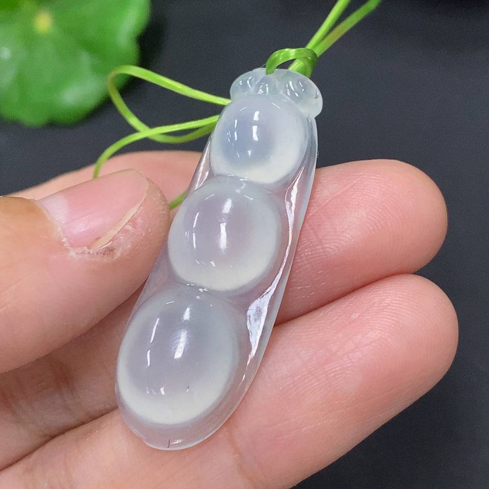 Huiliu Jadeite Lucky Bean Pendant featuring a carved jade bean with polished surface and natural green color.
