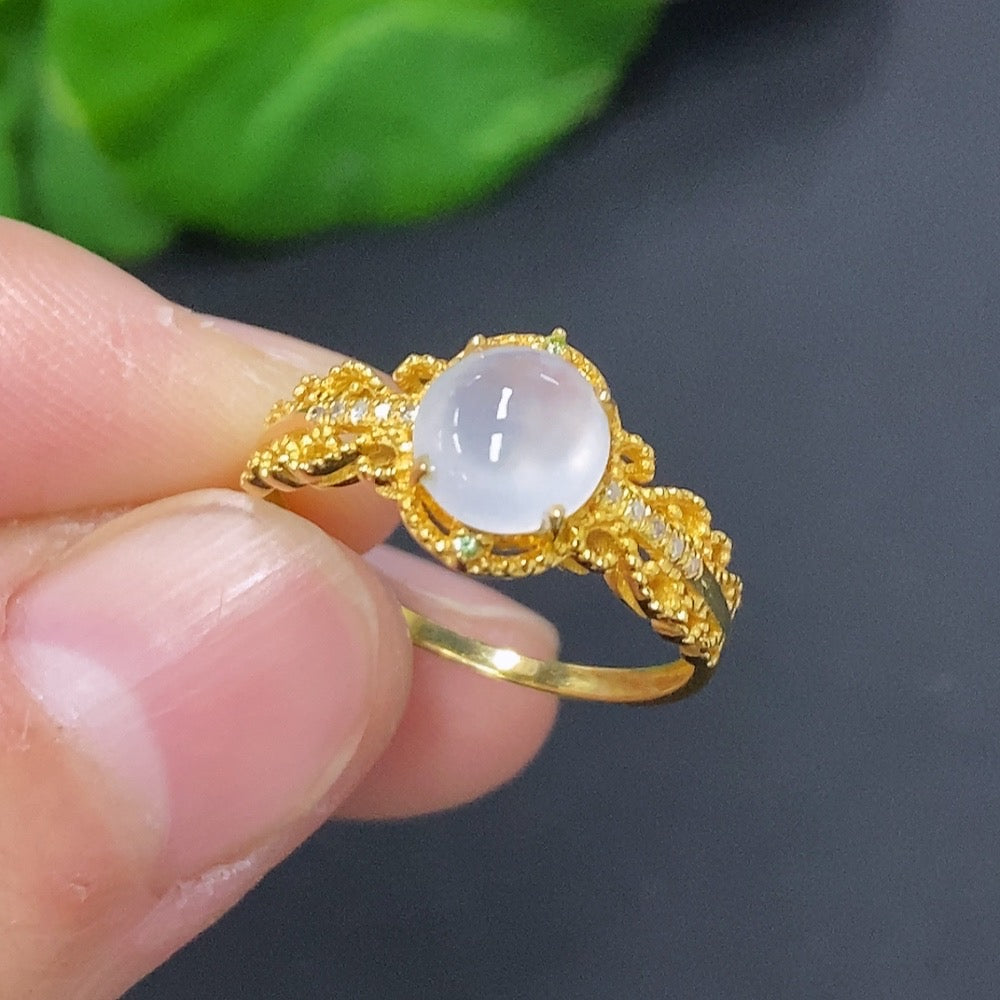 Jadeite cabochon ring with 18K gold band, accented with diamonds, size 13, from HUILIU HQ, weighing approximately 1.7g