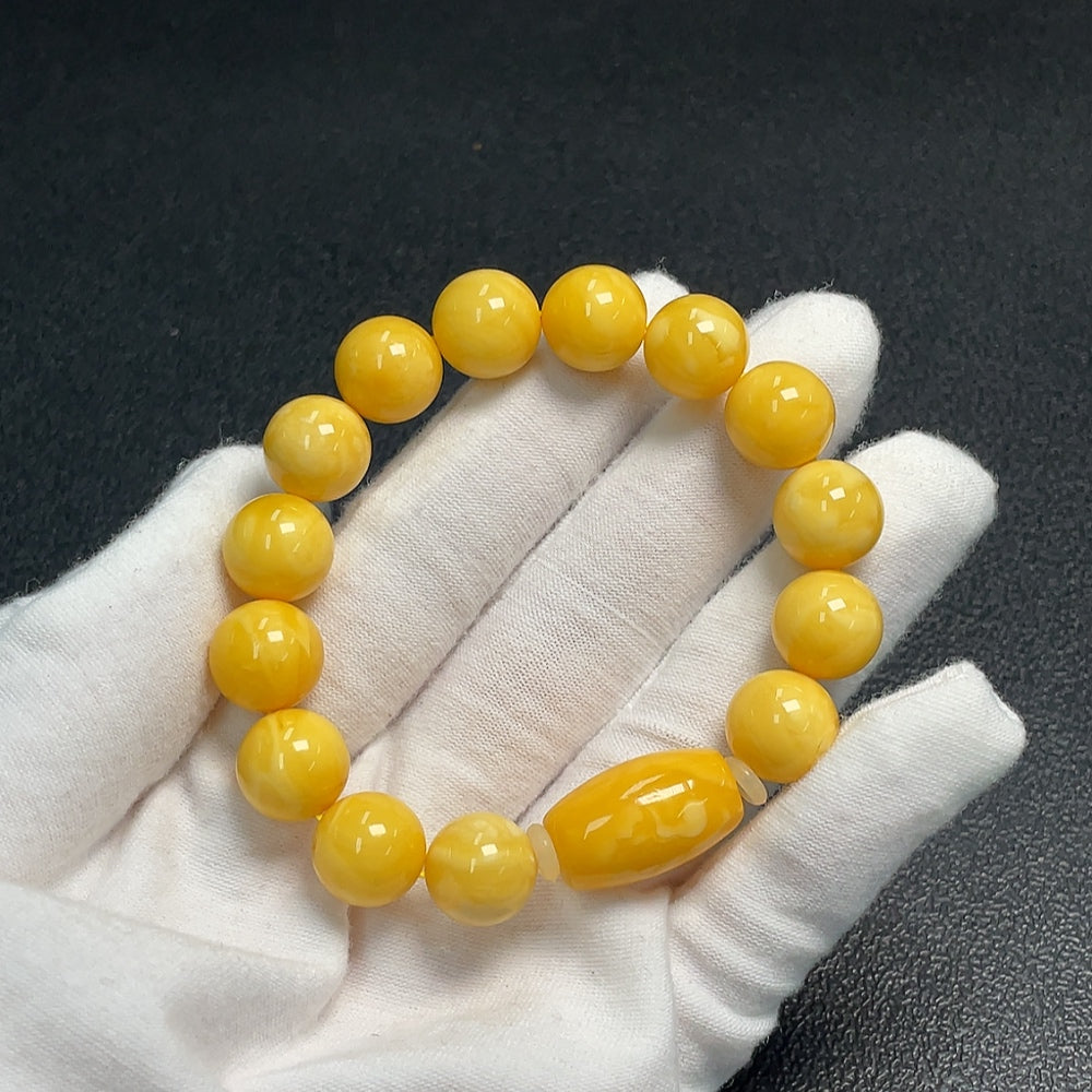 Huiliu Amber Beeswax Bracelet with 11.5mm beads, natural amber jewelry, certified HUILIU HQ craftsmanship.