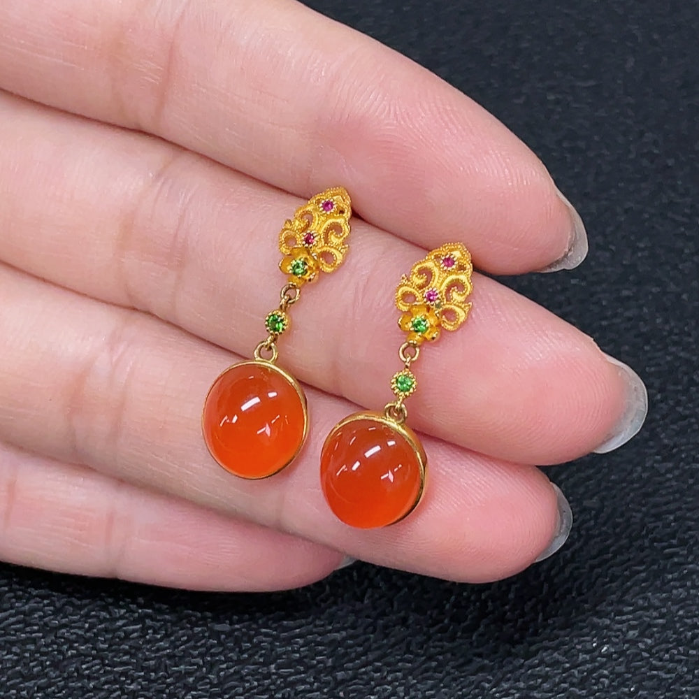 Red agate gemstone earrings with 18K gold accents, featuring non-natural stones and a total weight of 2.95g.