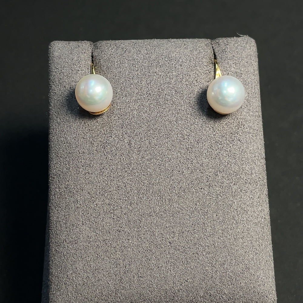 Seawater pearl earrings set in 18K gold with approximately 9.4mm pearls, featuring a luxurious and elegant design.