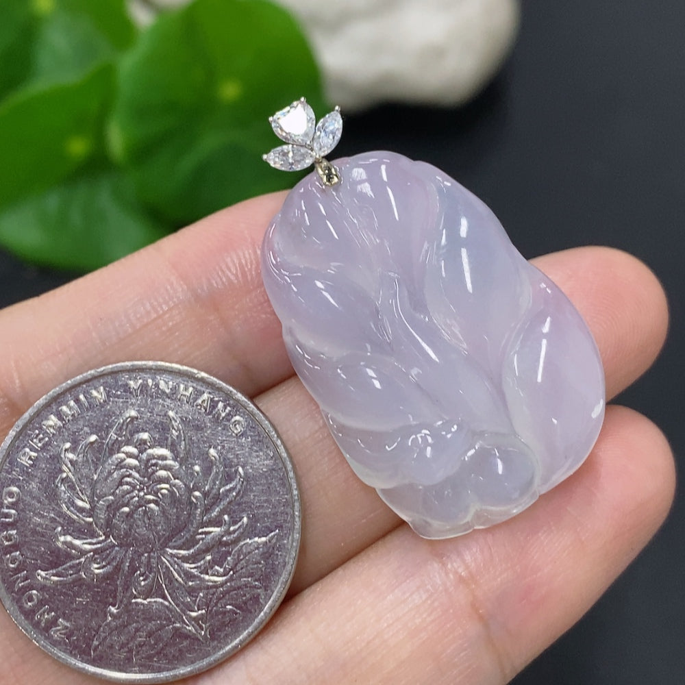 Jadeite nine-tailed fox pendant on a necklace with 18K gold clasp, detailed jade carving, shown against a neutral background.