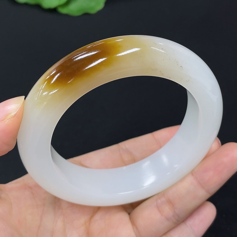 HKHQ Hetian Jade round bracelet, size 56.7 with approx. 91.5g weight, featuring smooth, polished jade beads.