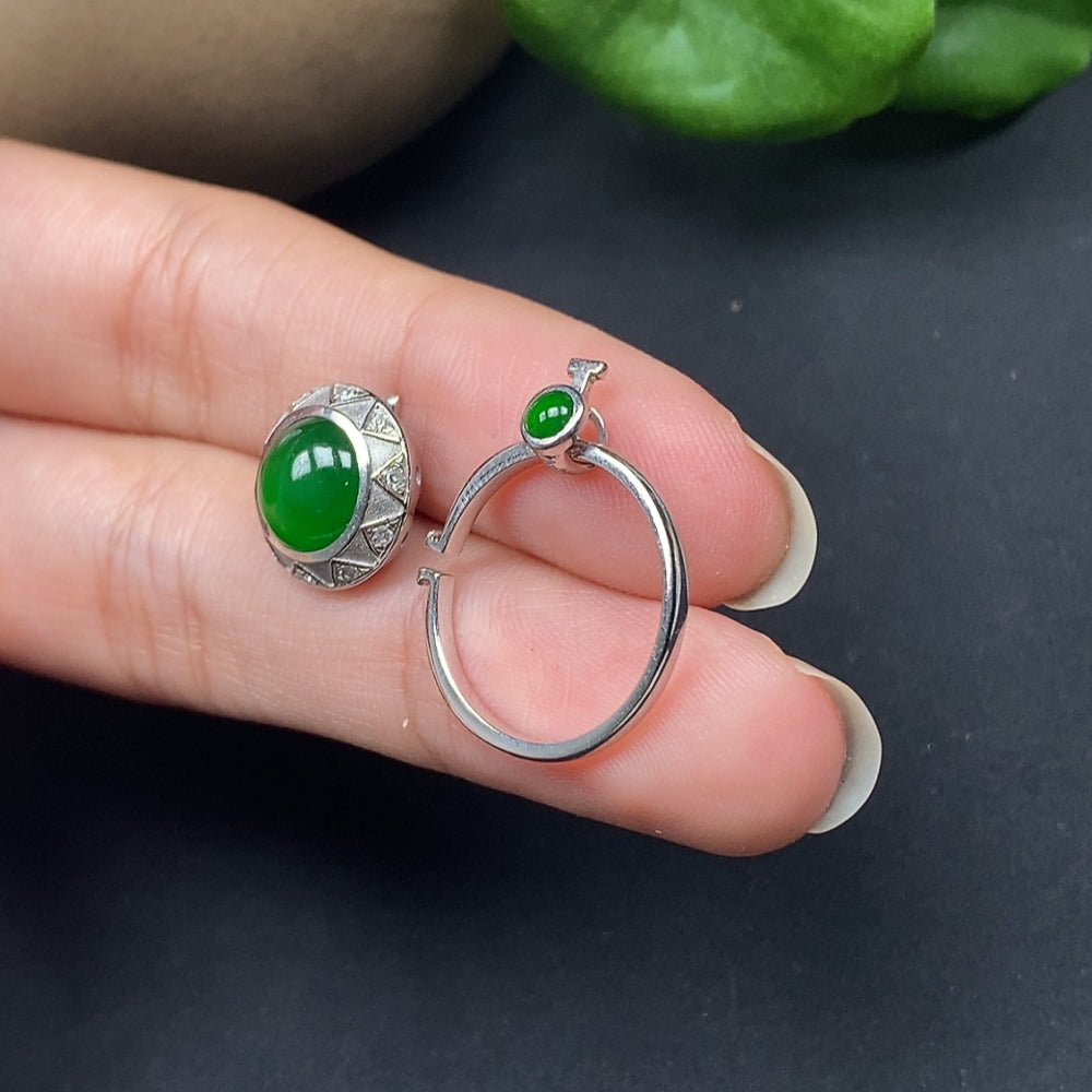 Jadeite jewelry set with two cabochons and diamonds in 18K gold, featuring elegant gemstone and precious metal craftsmanship.