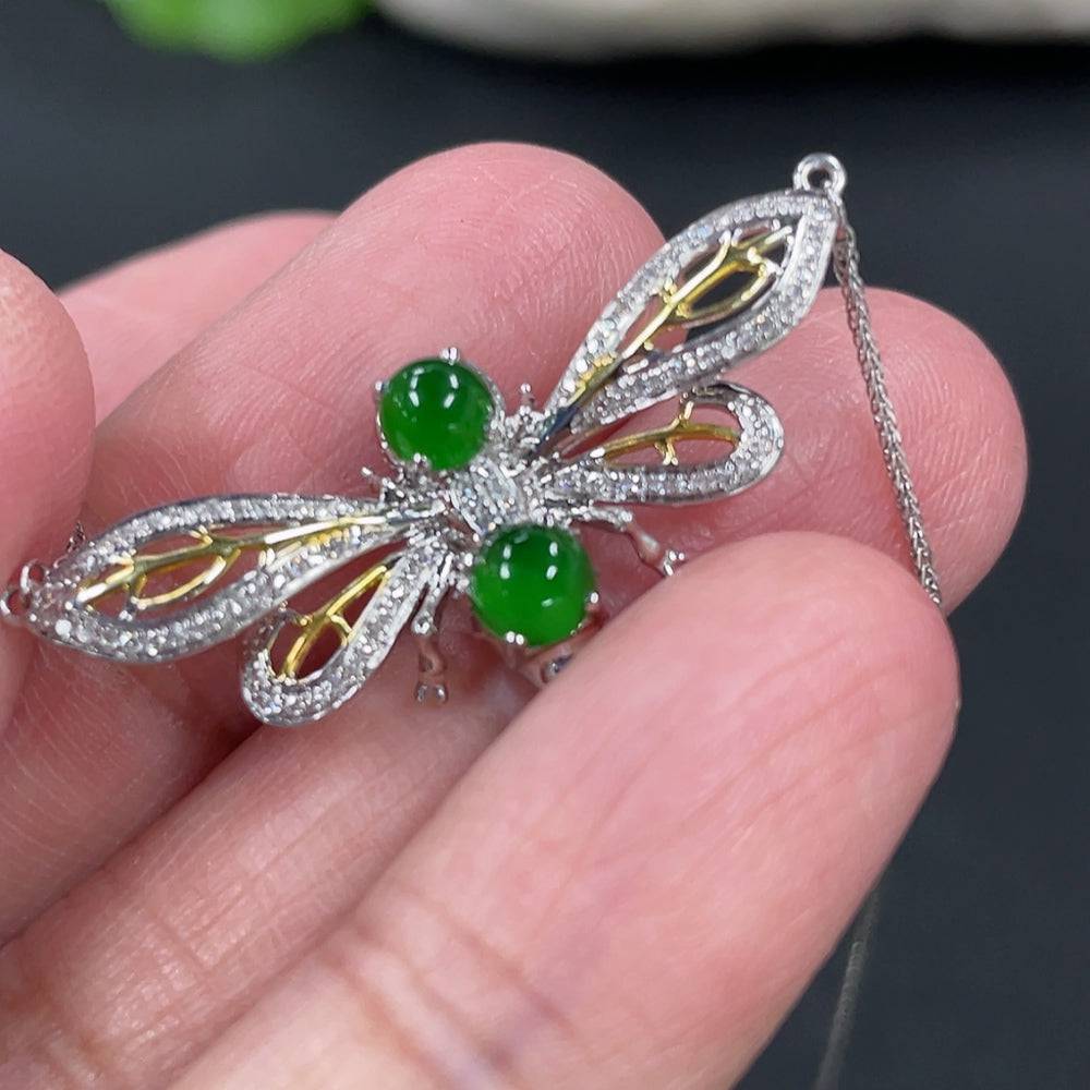 Huiliu Jadeite cabochon pendant necklace with diamond accents, showcasing a smooth green jade stone and elegant jewelry design