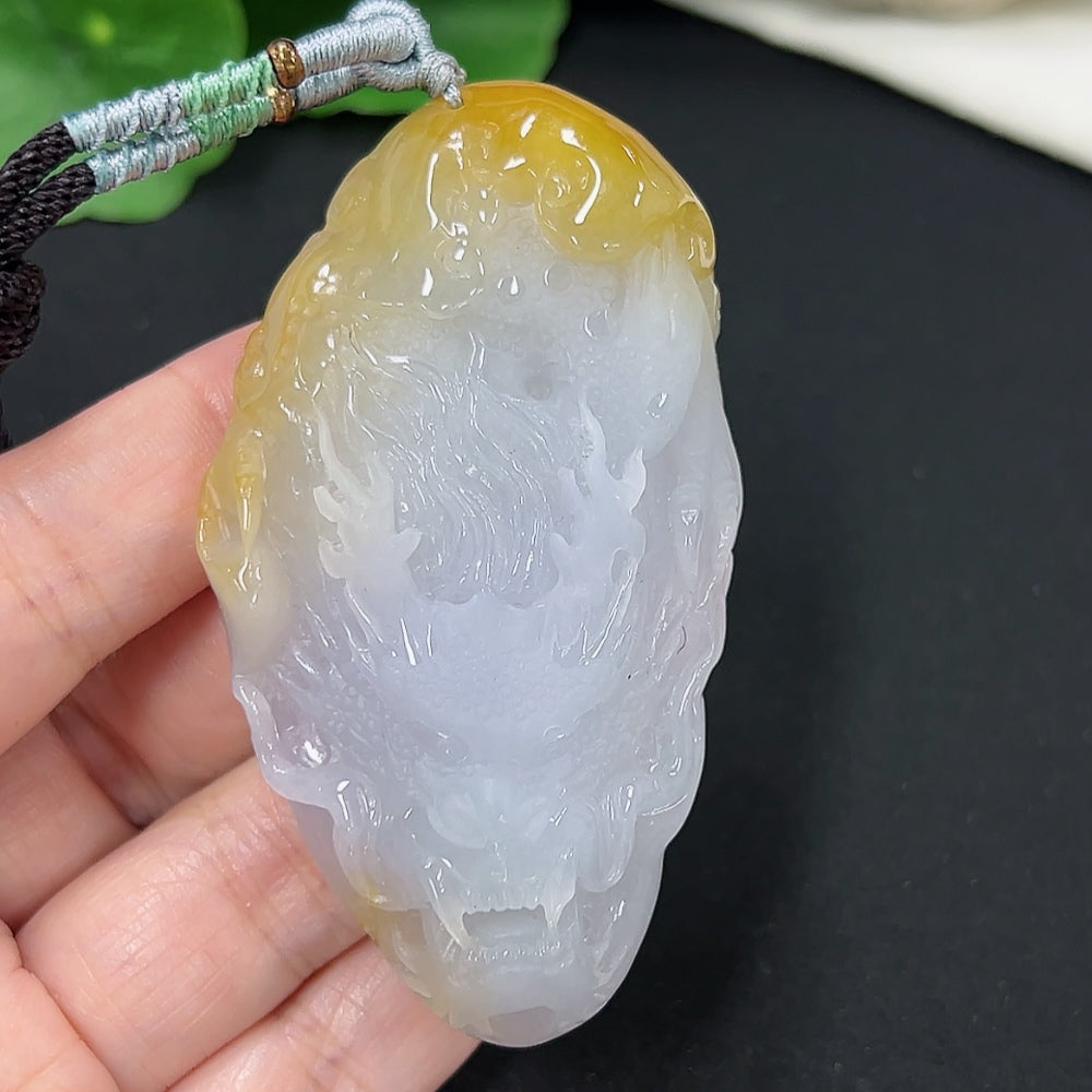 Jadeite dragon pendant from HKHQ featuring a detailed dragon design, weighs approx. 53.8g, includes rope, green jade color.