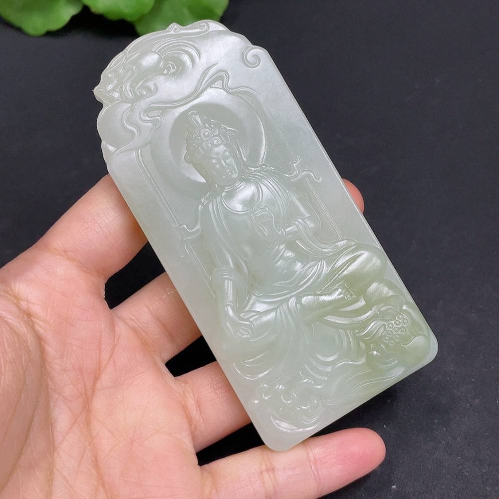 Huiliu Certified Hetian Jade Pendant featuring Guanyin figure, smooth polished surface, intricate carved details, and natural jade color.