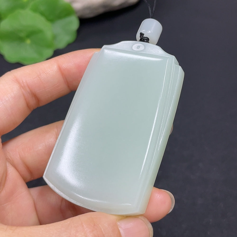 Hetian Jade plain pendant necklace by HKHQ, featuring a smooth, polished jade pendant with a natural stone appearance.