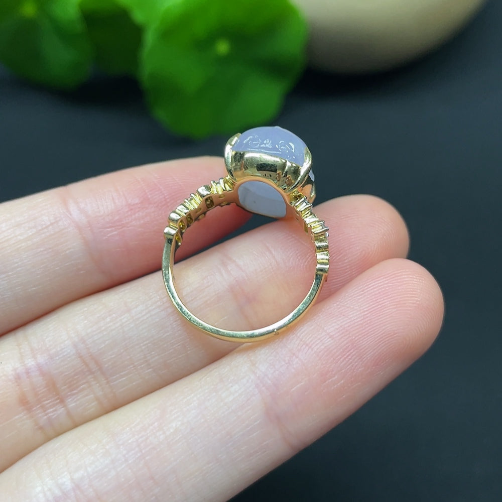 Jadeite Pi Xiu inlaid 18K gold ring with diamond accents, featuring intricate design and precious gemstone details.