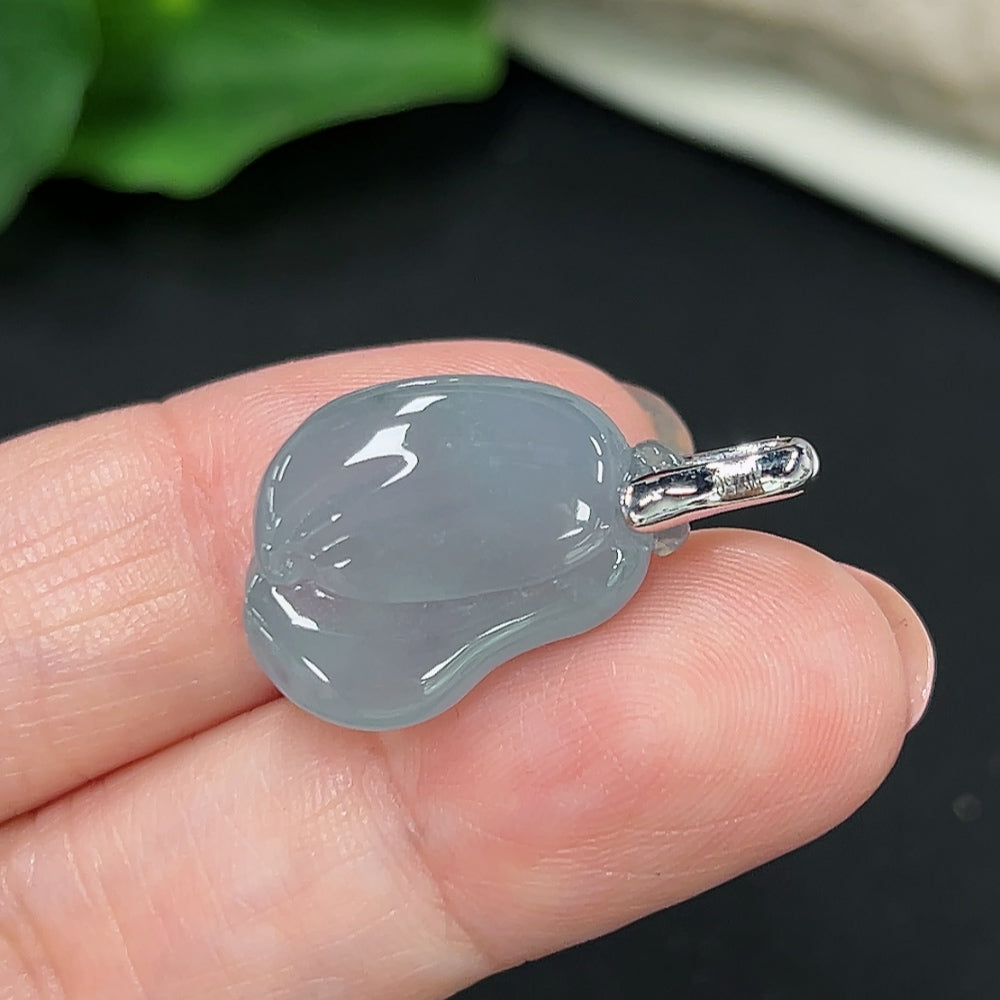 Jadeite pendant with diamond accents in 18K gold, featuring a smooth green jade stone and gold setting, weight approx. 3.9g