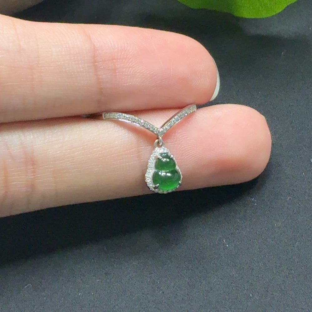 Jadeite gourd-shaped ring with diamond accents in 18k gold, size 14, weighing approximately 1.55g, by HKHQ.