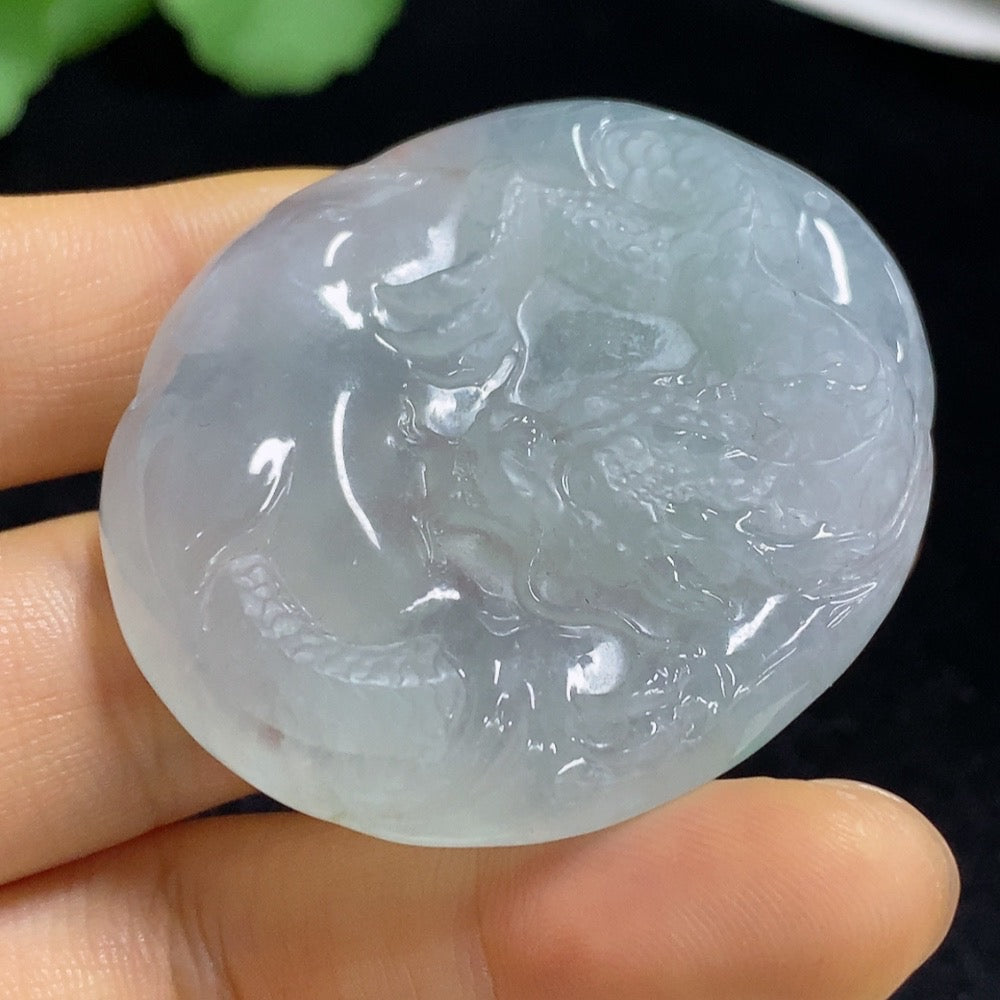 Jadeite pendant featuring a dragon design, crafted from jade, weighing approximately 33.56g, by HUILIU HQ.