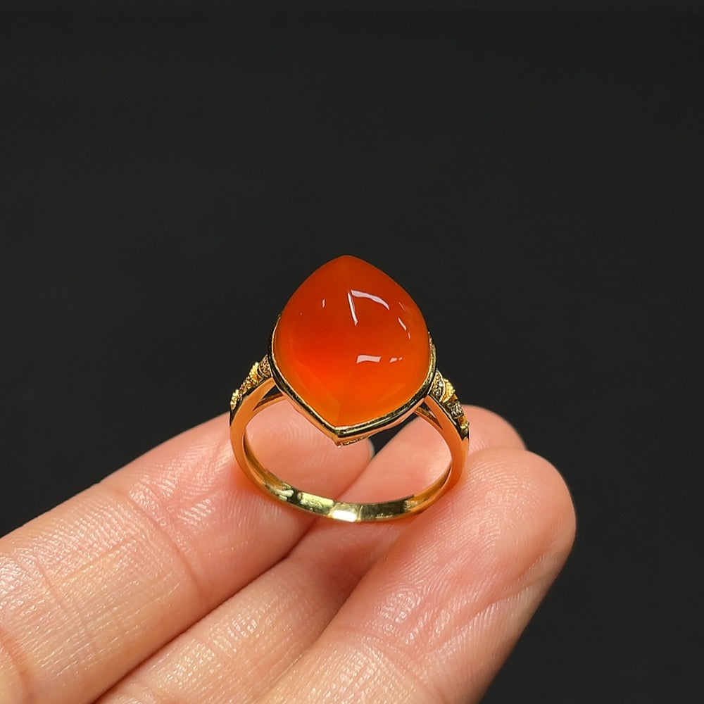 18K gold Southern Red Agate ring with diamond accents, showcasing a bold red gemstone and elegant gold band.