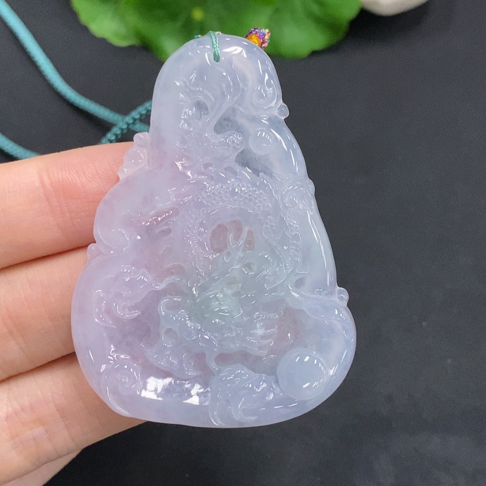 Huiliu Jadeite Dragon Soaring the Four Seas pendant featuring detailed dragon design on polished jade jadeite jewelry