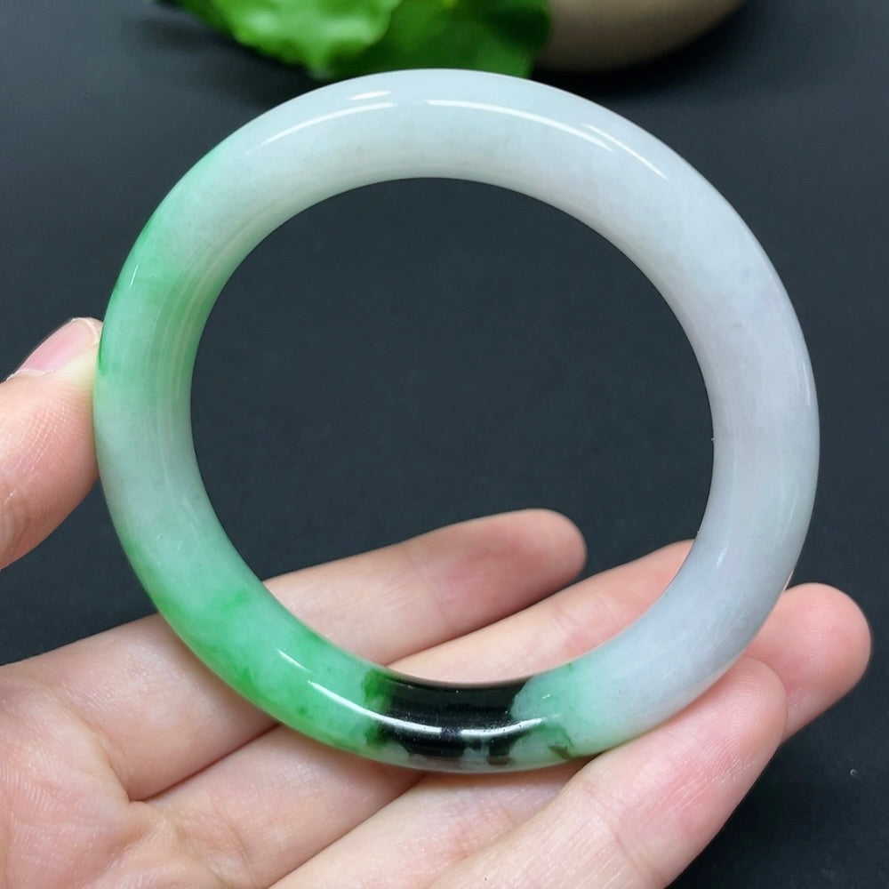 HKHQ jadeite round bangle in size 52.5 with a 51.35g weight, showcasing smooth, polished jadeite bracelet design.