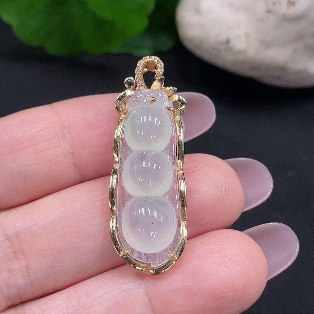 Huiliu Jadeite Fu Dou pendant with diamond accents, crafted from green jade, showcasing intricate carved design and polished finish.