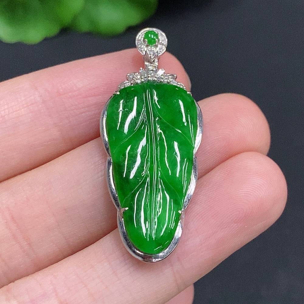 Jadeite leaf pendant with diamond accents, 18k gold, crafted by HUILIU HQ, weighs approx. 4 grams, showcasing detailed leaf design.