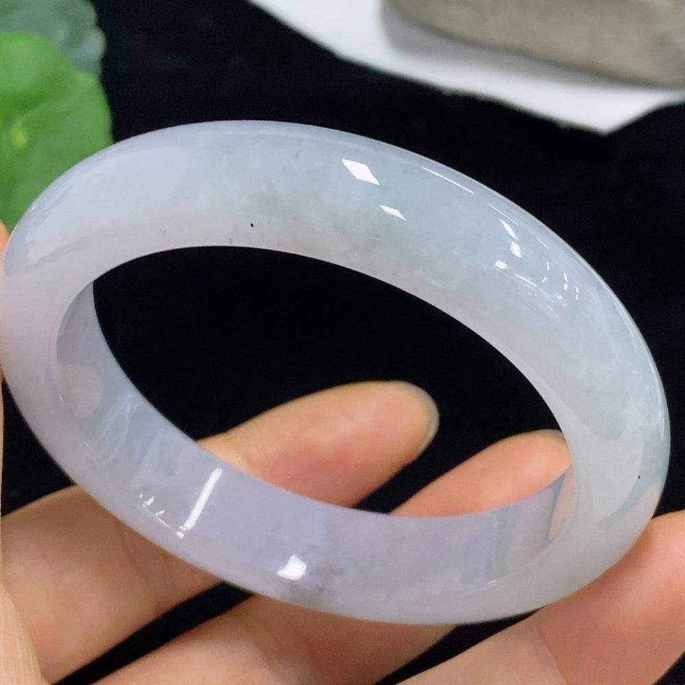Huiliu Jadeite round bracelet featuring polished green jade beads, certified by Huiliu, displayed on a neutral background.