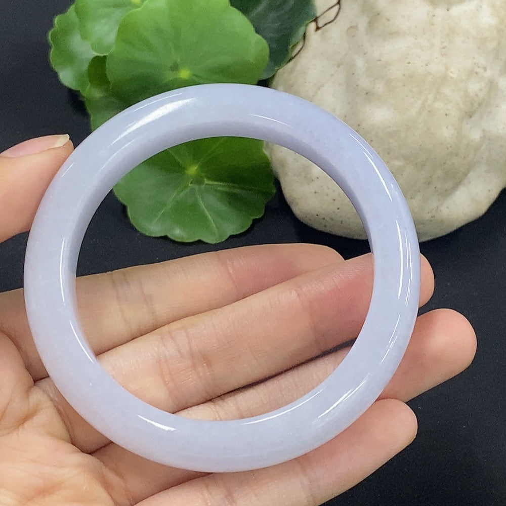 HKHQ jadeite round bracelet, size 53.7 with approximately 55.49g weight, showcases smooth, polished green jade beads.