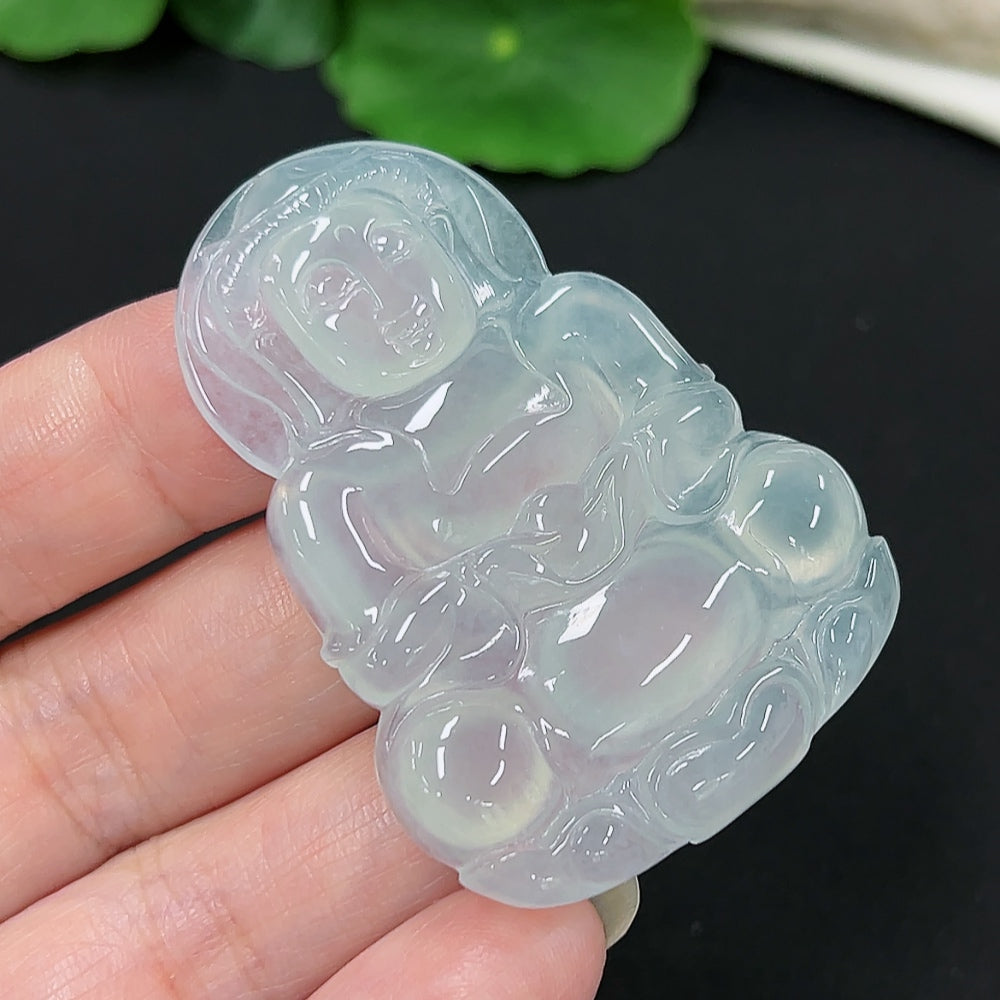 Jadeite Guanyin pendant in natural green jade, weighing approximately 21.1g, featuring detailed carvings and smooth polished surface.