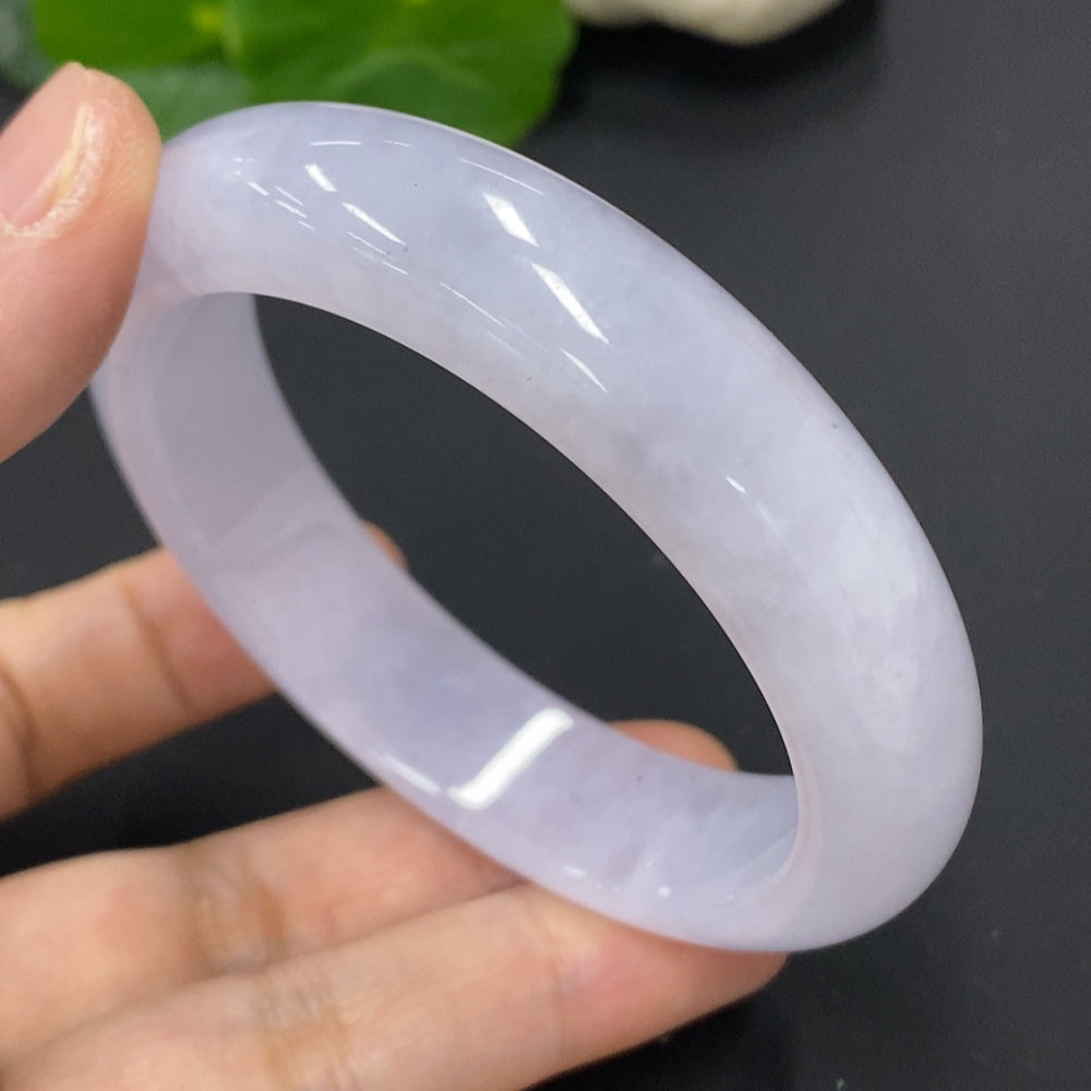 HKHQ jadeite round bangle, size 56.6, with a total weight of 67.5g, showcasing smooth, polished jadeite surface.