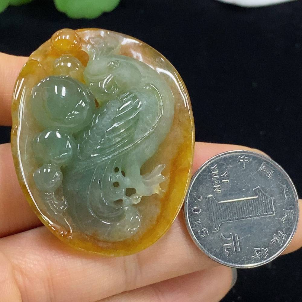 Huiliu certified jadeite pendant featuring a smooth, polished green jade stone with intricate carving details.