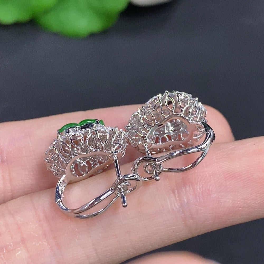 Jadeite gourd-shaped earrings in 18K gold with diamond accents, featuring intricate craftsmanship and elegant design.