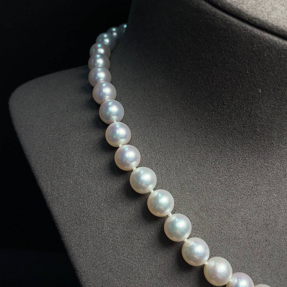HUILIU HQ seawater pearl necklace with 49.76g weight, 9.7mm pearls, non-gold, featuring lustrous round pearls on a delicate strand.