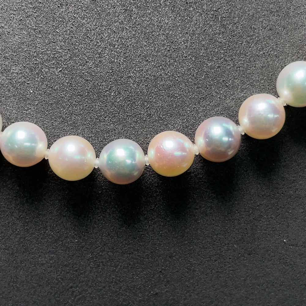 HKHQ seawater pearl necklace with undetermined color, 8.6mm pearls, weighing 46.43g, featuring elegant pearl strands.