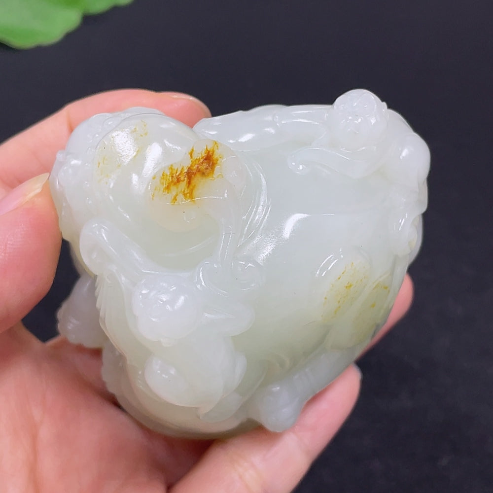 Hetian jade handheld carving titled "Attaining High Rank and Position" by HKHQ, featuring detailed jade craftsmanship.
