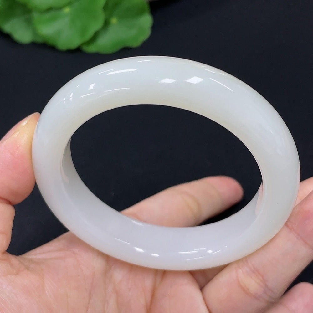 HKHQ Hetian Jade round bangle bracelet, size 52.2, weighing 56.3g, showcasing smooth, polished jade with natural green hues.