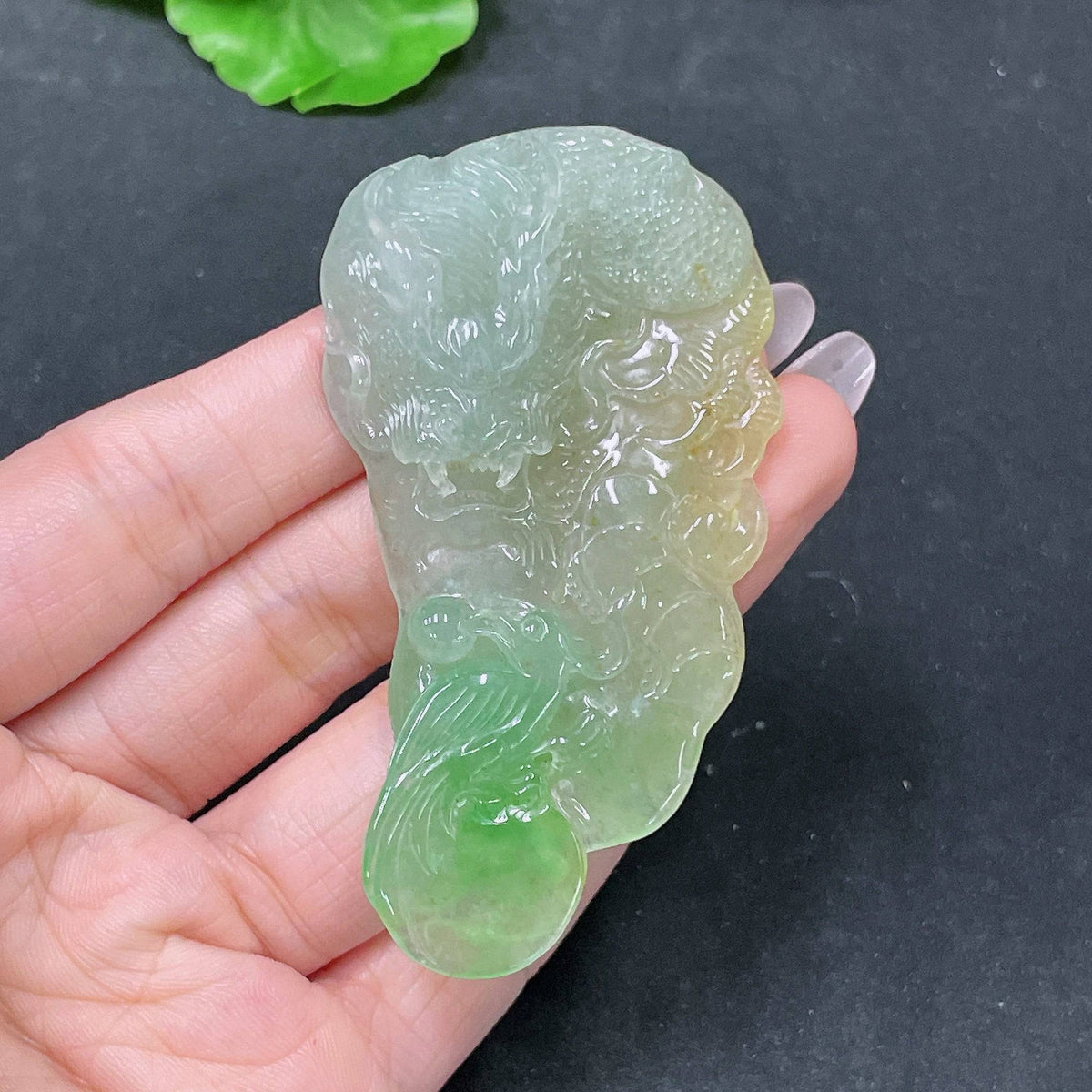 Jadeite pendant featuring a dragon plaque, crafted from green jade, weighing approximately 36.62 grams, by HUILIU HQ.