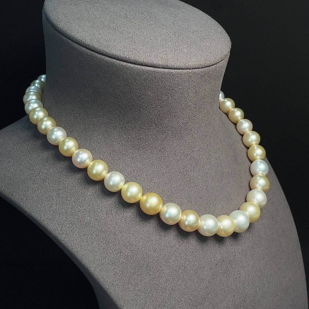 HUILIU HQ seawater pearl strand with 9.3-11.7mm pearls, non-gold setting, about 63.86g, natural pearl color, close-up view.