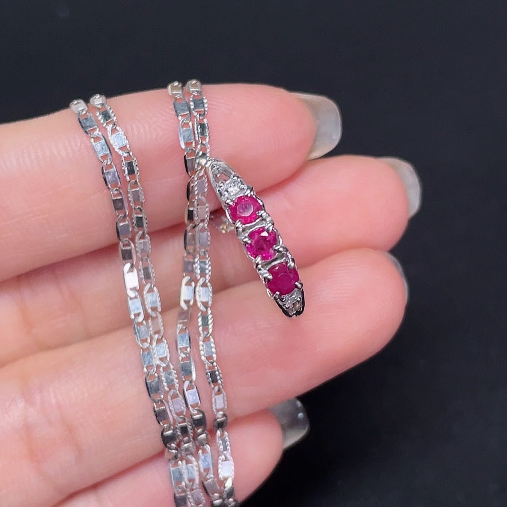 18k gold Ruby inlaid ring accented with diamonds, size 13, with chain, weighing approximately 4.69g, by HKHQ.