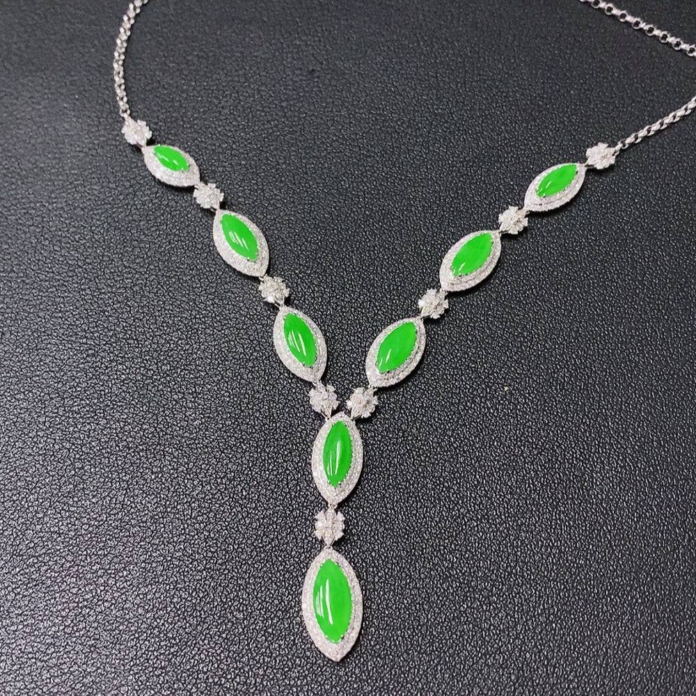 HUILIU HQ jadeite inlaid jewelry set with 18k gold, diamond accents including necklace, bracelet, earrings, and ring.