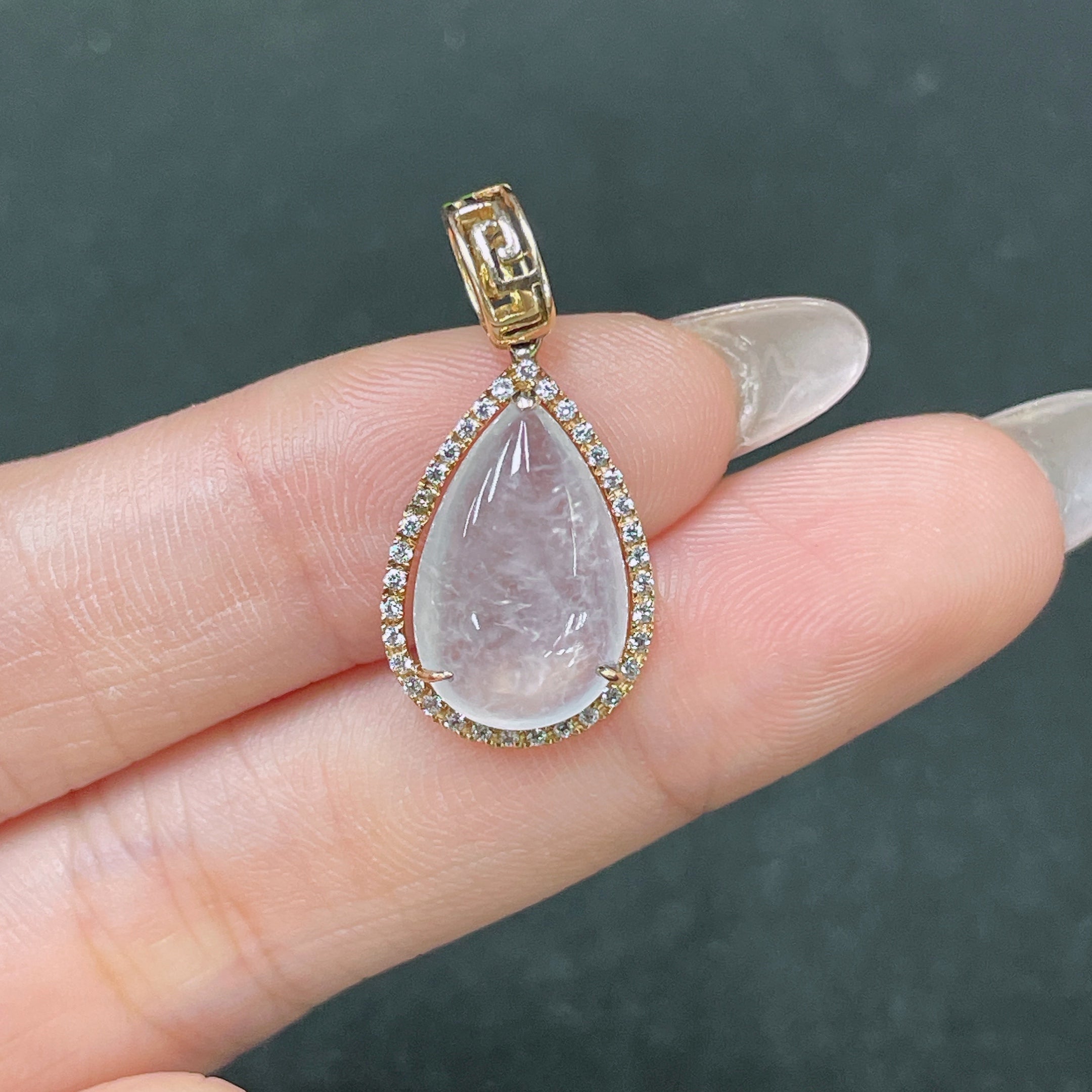 Jadeite teardrop inlay pendant with no印记 gold content tested扣头18k main body gold content 52% non-diamond total weight approximately 2.33g