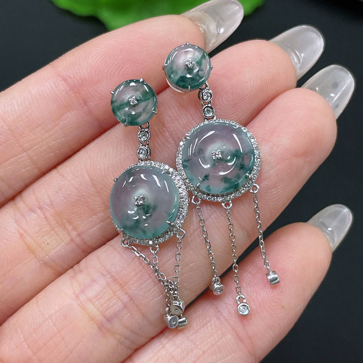 Huiliu Jadeite safety buckle earrings with diamond accents, featuring inlaid jade and included ear backs.