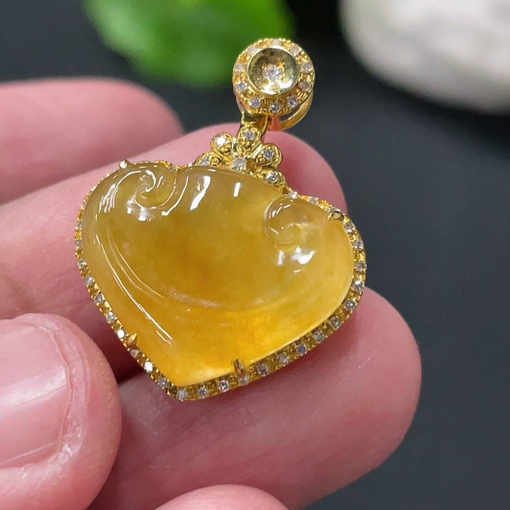 Jadeite Ruyi pendant with 18K gold and diamond accents from HUILIU HQ, showcasing intricate inlay and polished jade surface.