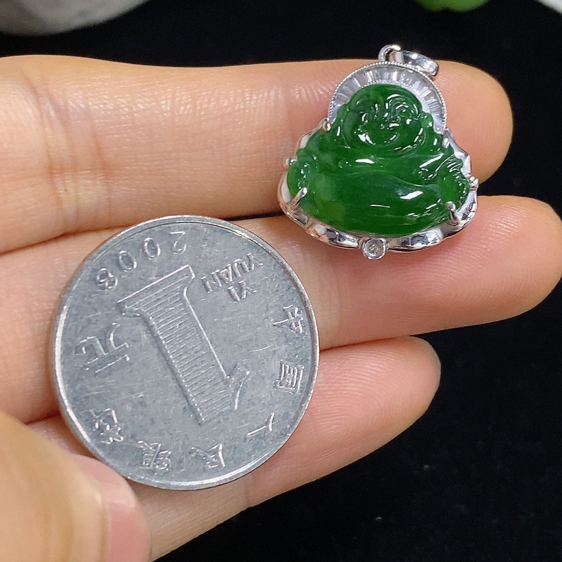 Jadeite Buddha pendant necklace with 18K gold and diamond accents, featuring a detailed Buddha figure in the image.