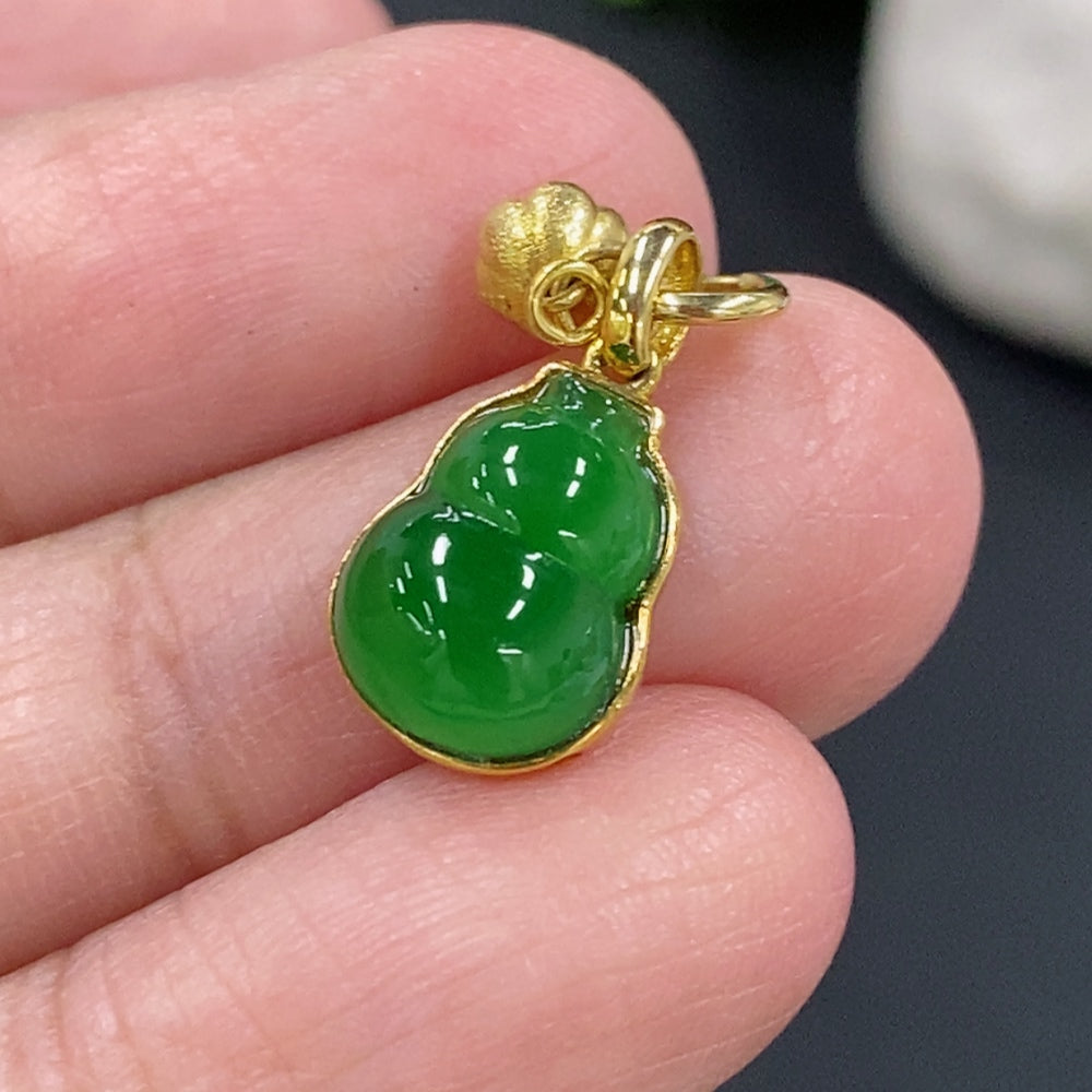 Jadeite gourd pendant necklace with 18K gold from HKHQ featuring a smooth, polished jadeite gourd charm on a delicate gold chain.