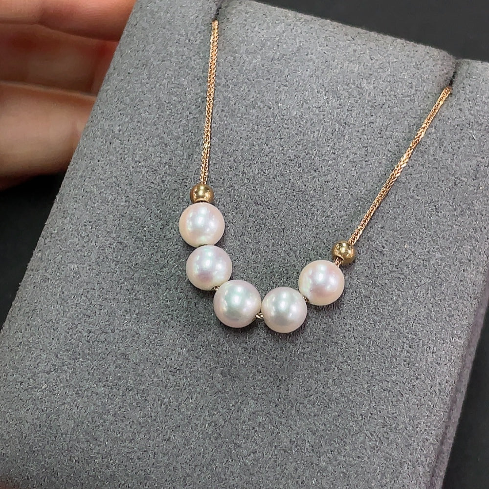 Seawater pearl necklace with 18k gold clasp, 5.6mm pearls, total weight approx. 2.32g, by HKHQ.